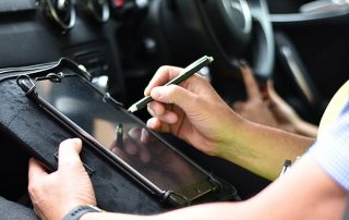 DVSA Examiner with tablet